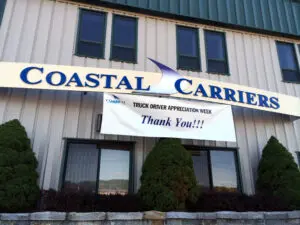 Coastal Carriers Building with Thank You Banner